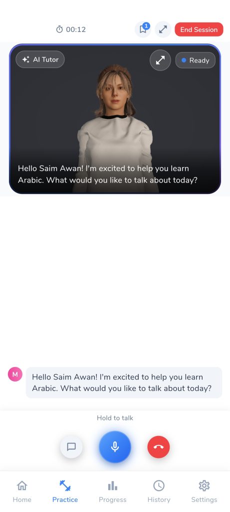 The FluencyZone AI tutor mid-conversation, with a hold-to-talk microphone button
